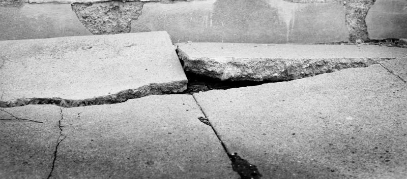 What Causes Concrete Cracks, Spalling, And Surface Damage